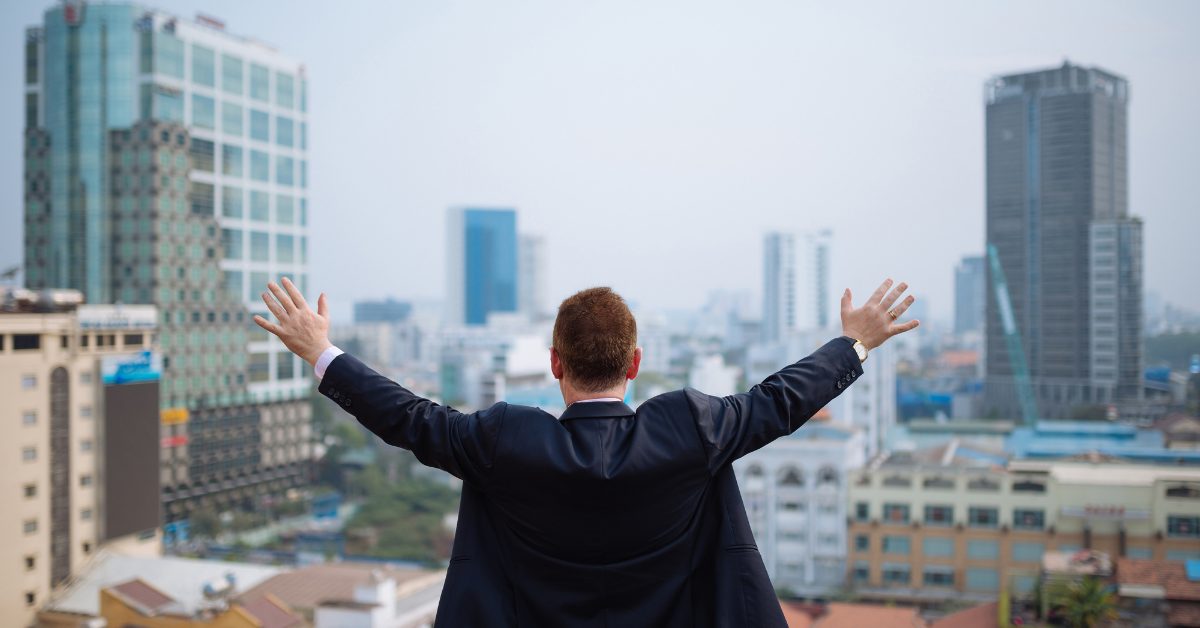 Commercial real estate brokers discussing property transactions